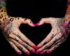 Two heart tattoo on hand