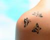 Three butterfly tattoo