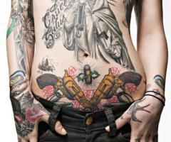 Gun tattoo for women