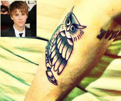 Justin Bieber owl tattoo