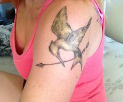 The hunger games movie tattoo