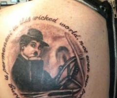 Charlie Chaplin portrait and quote tattoo