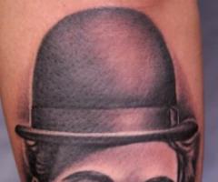 Charlie Chaplin / Adolf Hitler by Nikko Hurtado