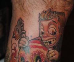 Tattooist and mexican sugar skull