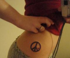 Tatuaje del símbolo de paz