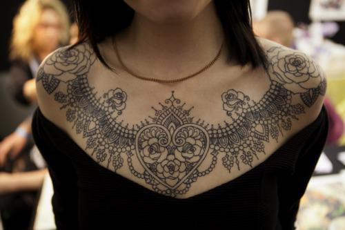 Decorative heart chest tattoo