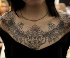 Decorative heart chest tattoo