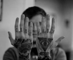 Hand and finger tattoo