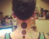 Circle tattoos on neck