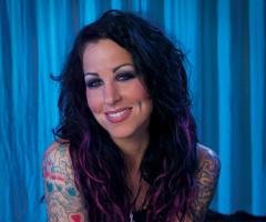 Pixie Acia side tattoos