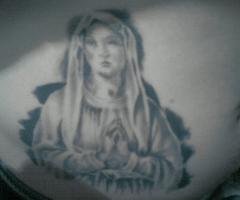 Tatuaje de la virgen de lourdes