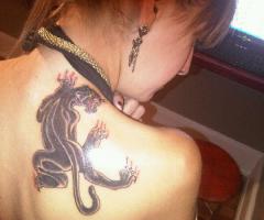 Juliet Simms panther tattoo