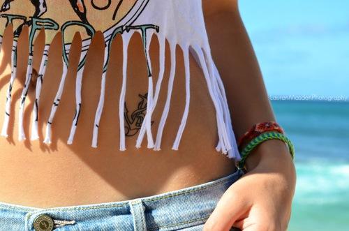 Cute girl with anchor tattoo