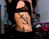 Anchor tattoo on side