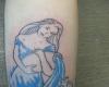 Aquarius tattoo for girl