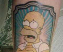 Praise Jebus by Homer Simpson tattoo
