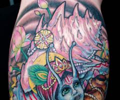Krishna snail tattoo