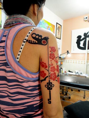 Cherry blossom and key tattoo