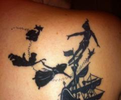 Peter Pan book tattoo