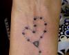 Religious arm tattoo design