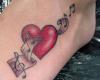 Heart and Music note symbols tattoo