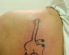 Acoustic guitar tattoo