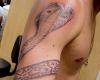 http://www.tattooset.com/images/tattoo/2012/12/07/13703-cobra-tattoo-for-men_tiny.jpg