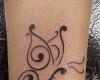 Butterfly tribal tattoo