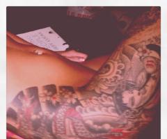Thigh sleeve tattoo