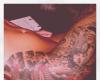 Thigh sleeve tattoo