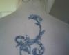 http://www.tattooset.com/images/tattoo/2012/12/09/13730-back-flower_tiny.jpg