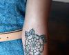 Tatuaje de flores para el brazo