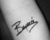 Beyoncé sign tattoo