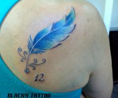 20 Adorable Feather Tattoos
