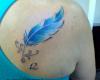 Pluma tattoo