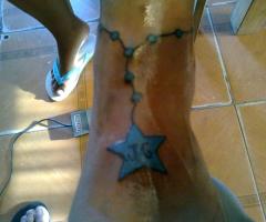 Rosario con estrella e iniciales