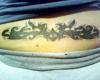 Tribal lower back tattoo
