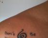 Don't worry, be happy tribal tattoo