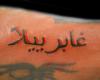 Tatuaje de letras árabe