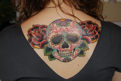 skull and roses on back
