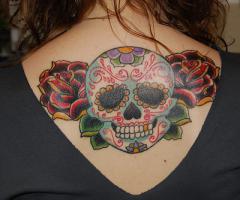skull and roses on back