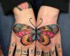 Hand butterfly colorful tattoo