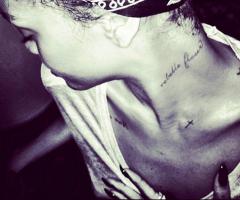 Rihanna says her Rebelle Fleur neck tattoo