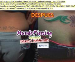 Tribal en la cadera (tapando otro tattoo)