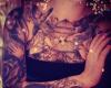 Birds and butterfly on chest