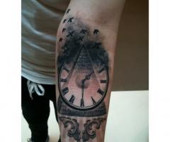 Pyramid and clock tattoo