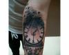 Pyramid and clock tattoo