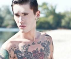 Roses and guns on chest