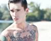 Roses and guns on chest