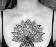 Lotus on chest